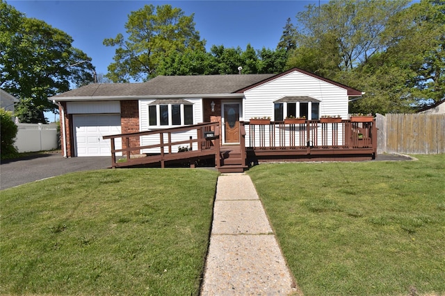 324 W 16th St, Deer Park, NY 11729 - single story home featuring a garage, brick siding, driveway, a deck, and a shingled roof
