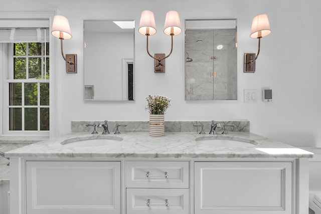 9 Springdale Rd, Scarsdale, NY 10583 - bathroom with double vanity and a shower with door