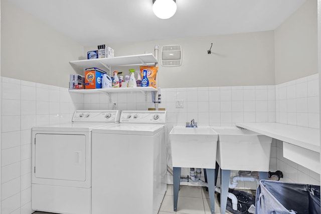 9 Springdale Rd, Scarsdale, NY 10583 - laundry area with tile walls, washer and dryer, and light tile patterned flooring