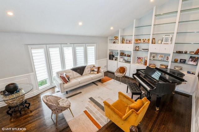 756 Dumont Pl, North Woodmere, NY 11581 - living room featuring lofted ceiling, wood finished floors, plenty of natural light, a wainscoted wall, and built in shelves