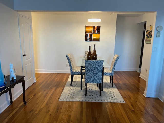 101 Jackson Ave Unit 4A, Mineola, NY 11501 - dining area featuring wood finished floors and baseboards