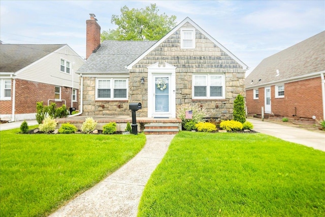 139 Euston Rd S, West Hempstead, NY 11552 - bungalow featuring stone siding, a front yard, a chimney, and a shingled roof