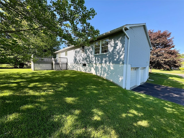 25 White Farm Rd, Wingdale, NY 12594 - view of property exterior featuring an attached garage, driveway, a lawn, and a deck