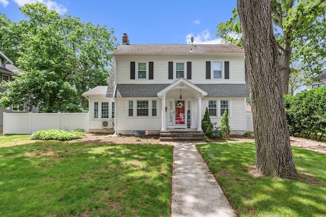 177 N Long Beach Ave, Freeport, NY 11520 - view of front of home with a chimney and roof with shingles