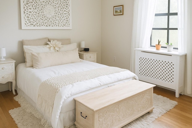 68 E Hartsdale Ave Unit 5E, Hartsdale, NY 10530 - bedroom with light wood finished floors