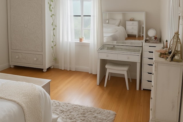 68 E Hartsdale Ave Unit 5E, Hartsdale, NY 10530 - bedroom featuring light wood-style flooring and baseboards