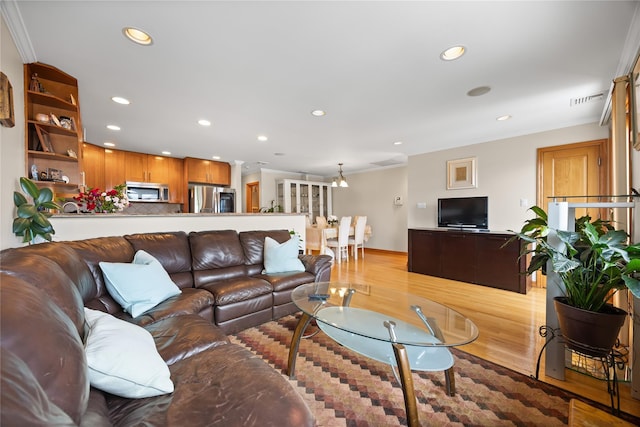 154-16 13th Ave, Whitestone, NY 11357 - living room featuring wood finished floors, recessed lighting, and baseboards