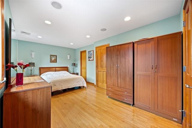 154-16 13th Ave, Whitestone, NY 11357 - bedroom with light wood-type flooring and recessed lighting