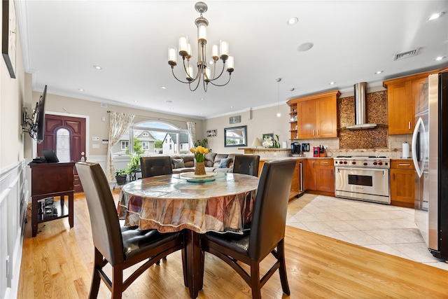 154-16 13th Ave, Whitestone, NY 11357 - dining area with crown molding, a chandelier, wainscoting, recessed lighting, and light tile patterned floors