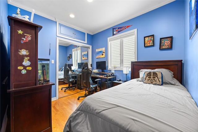 154-16 13th Ave, Whitestone, NY 11357 - bedroom featuring wood finished floors, ornamental molding, a closet, recessed lighting, and a desk