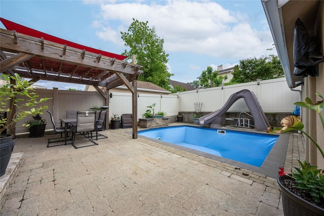 154-16 13th Ave, Whitestone, NY 11357 - view of swimming pool with a water slide, a pergola, a patio, and a fenced backyard