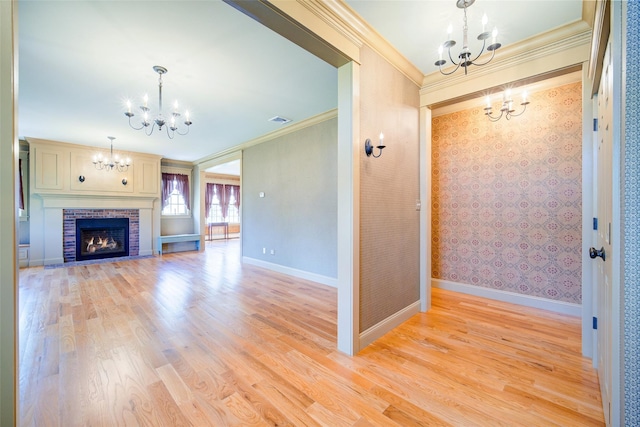 231 Turtle Bay Rd, New Hampton, NY 10958 - unfurnished living room with a chandelier, ornamental molding, light wood-type flooring, wallpapered walls, and baseboards