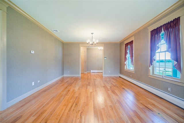 231 Turtle Bay Rd, New Hampton, NY 10958 - empty room with crown molding, a baseboard heating unit, a chandelier, wood finished floors, and baseboards