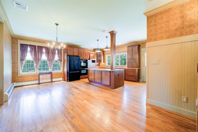 231 Turtle Bay Rd, New Hampton, NY 10958 - kitchen with black appliances, wallpapered walls, brown cabinetry, a kitchen island, and light wood finished floors