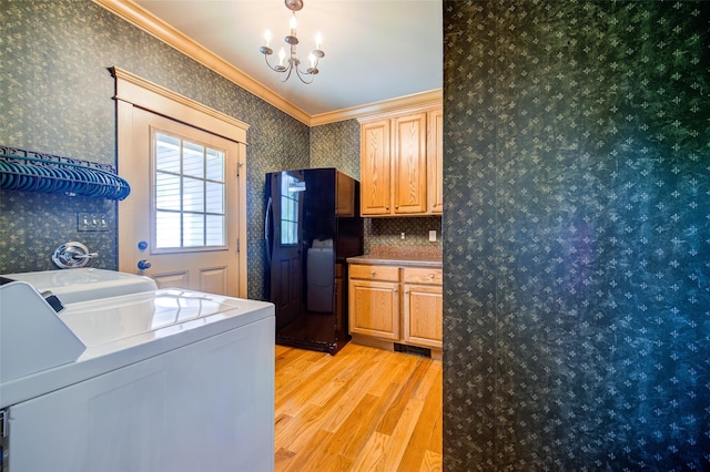 231 Turtle Bay Rd, New Hampton, NY 10958 - laundry room featuring wallpapered walls, light wood finished floors, washing machine and clothes dryer, a chandelier, and ornamental molding