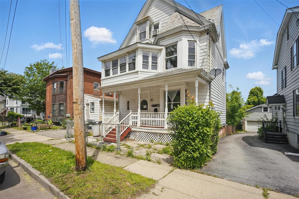 30 Overlook Place, Newburgh, NY 12550 - view of front of property featuring covered porch and an outbuilding