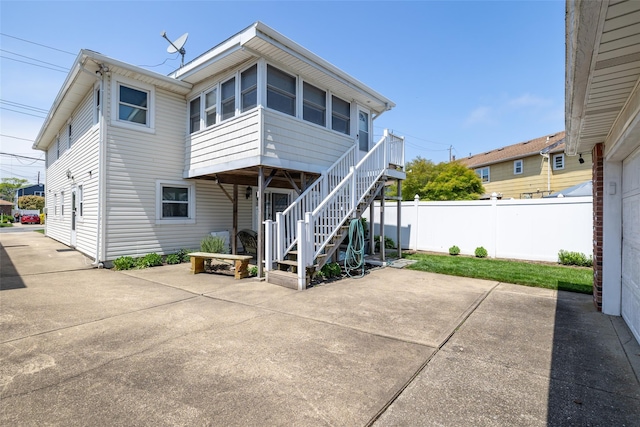 563 Long Beach Rd, Island Park, NY 11558 - back of house featuring a patio area and stairs