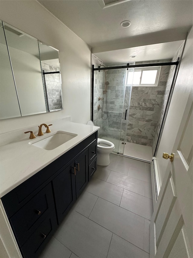 563 Long Beach Rd, Island Park, NY 11558 - bathroom featuring vanity, a baseboard radiator, a stall shower, and tile patterned floors