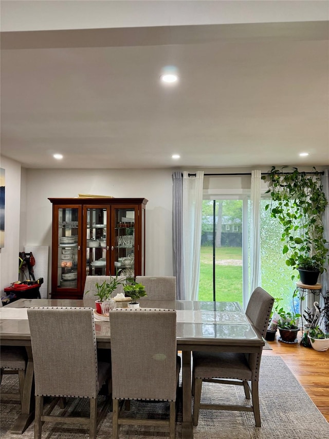 2337 Sycamore Ave, Ronkonkoma, NY 11779 - dining area featuring wood finished floors and recessed lighting