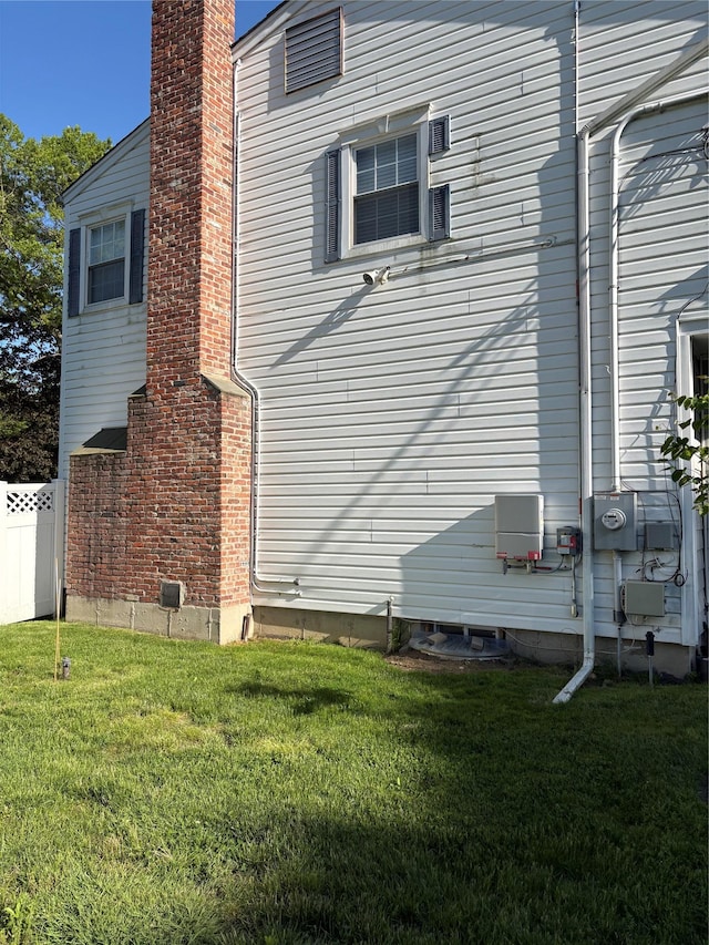 2337 Sycamore Ave, Ronkonkoma, NY 11779 - view of home's exterior featuring a chimney