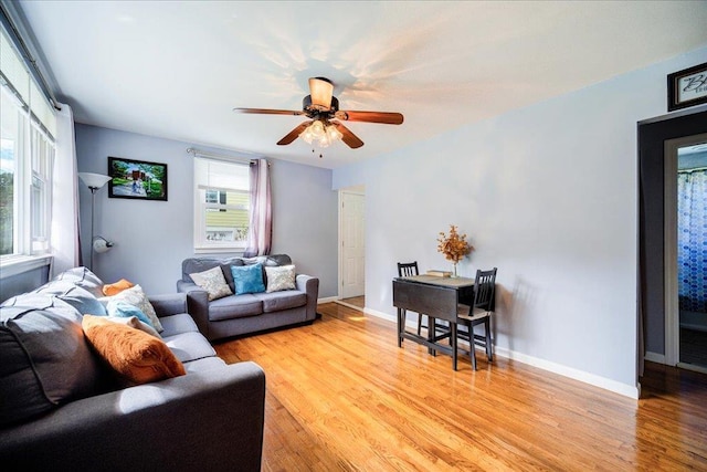26 Booth Blvd, Wappingers Falls, NY 12590 - living area featuring light wood-style floors, ceiling fan, and baseboards