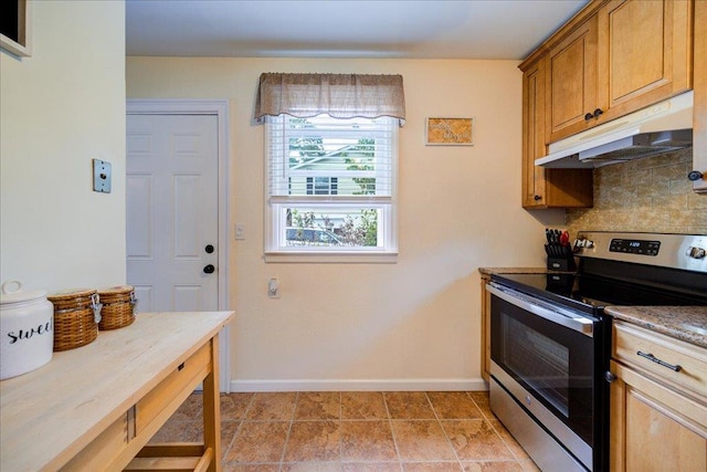 26 Booth Blvd, Wappingers Falls, NY 12590 - kitchen featuring under cabinet range hood, stainless steel range with electric cooktop, baseboards, tasteful backsplash, and brown cabinets