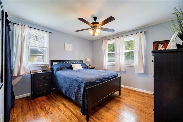 26 Booth Blvd, Wappingers Falls, NY 12590 - bedroom featuring baseboards, wood finished floors, and a ceiling fan