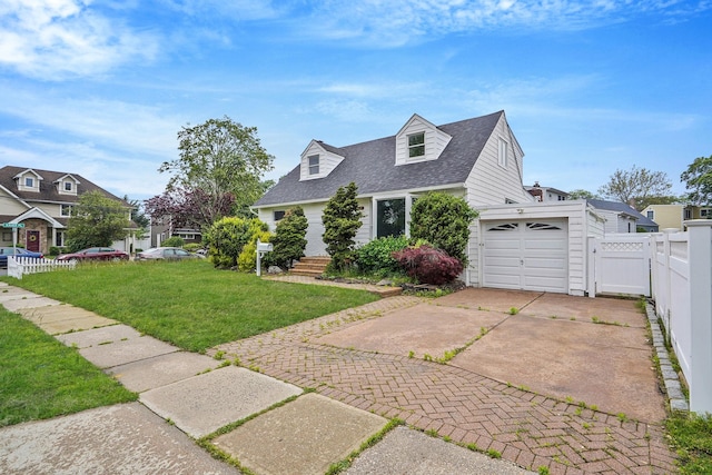 3061 Xavier Ct, Oceanside, NY 11572 - new england style home featuring concrete driveway, roof with shingles, a gate, and a garage