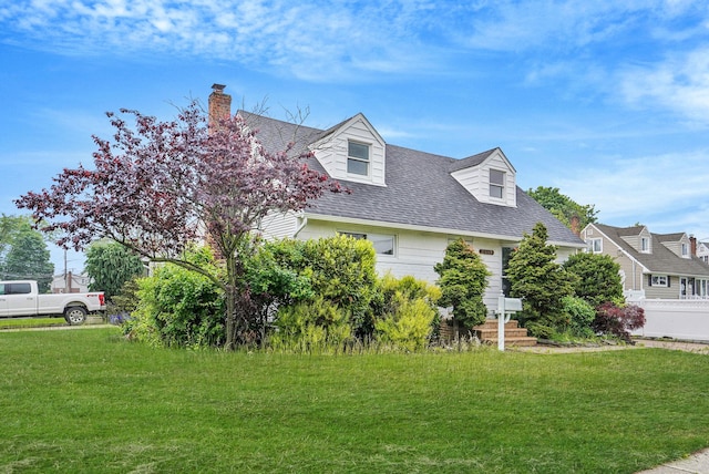 3061 Xavier Ct, Oceanside, NY 11572 - view of side of home with a chimney and a shingled roof