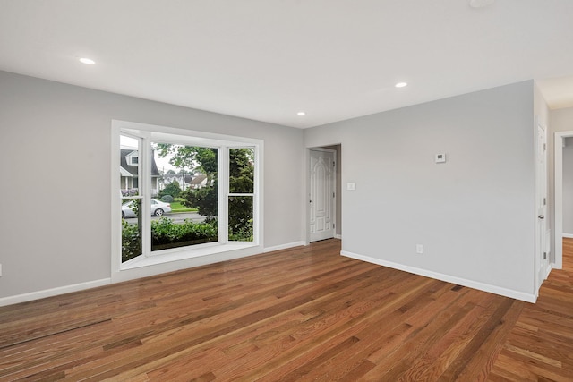 3061 Xavier Ct, Oceanside, NY 11572 - empty room featuring wood finished floors, baseboards, and recessed lighting
