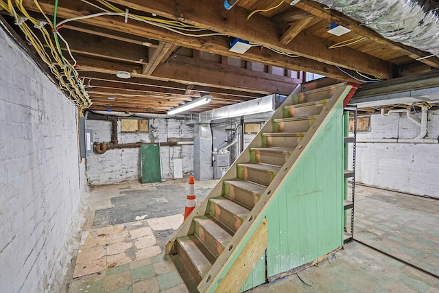 3061 Xavier Ct, Oceanside, NY 11572 - unfinished below grade area featuring stairway and heating unit