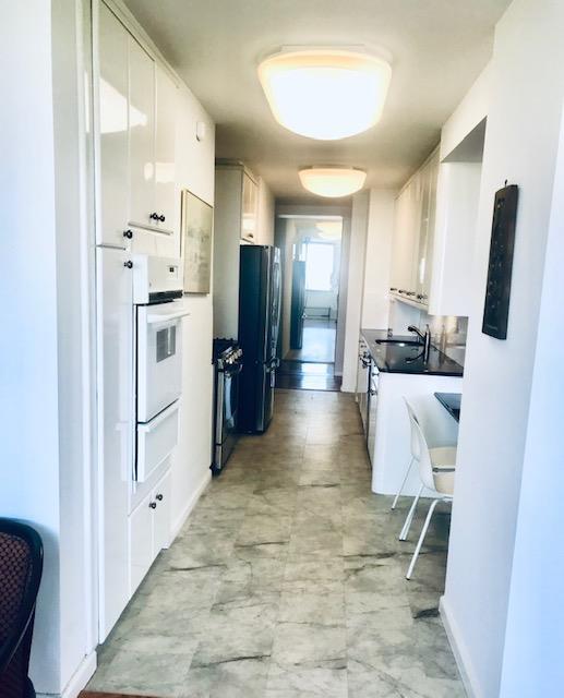 27110 Grand Central Pkwy Unit 28K, Floral Park, NY 11005 - photo 5