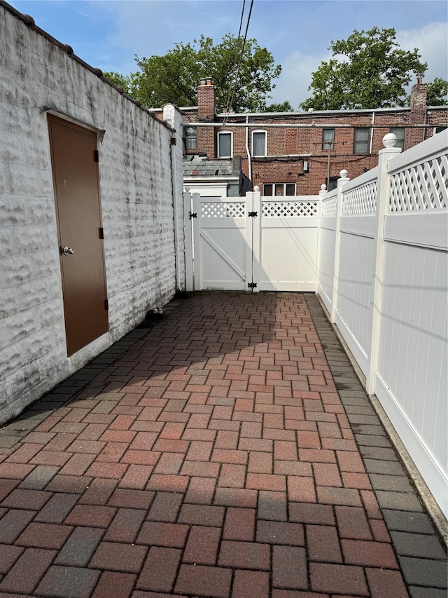 6472 84th St, Middle Village, NY 11379 - view of patio with a gate
