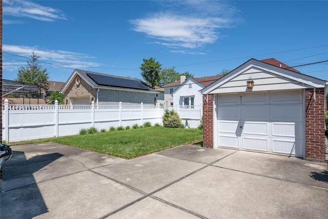 8123 260th St, Glen Oaks, NY 11004 - detached garage featuring concrete driveway