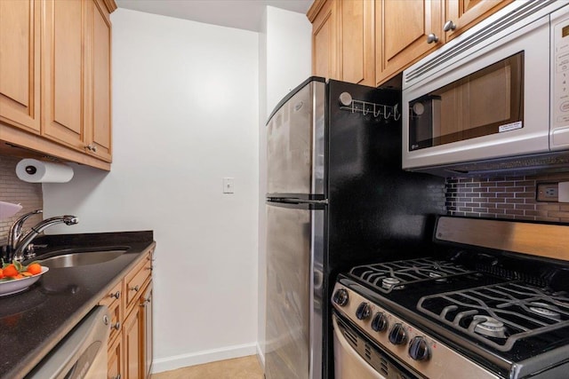 240 Garth Rd Unit 3L2, Scarsdale, NY 10583 - kitchen featuring white appliances, backsplash, and dark stone countertops
