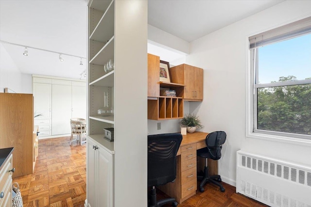 240 Garth Rd Unit 3L2, Scarsdale, NY 10583 - home office with radiator heating unit and rail lighting