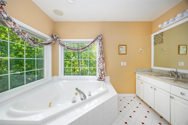 3 Cambridge Ct, Wappingers Falls, NY 12590 - bathroom featuring a whirlpool tub, vanity, and tile patterned floors