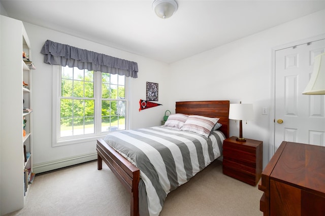3 Cambridge Ct, Wappingers Falls, NY 12590 - carpeted bedroom featuring a baseboard heating unit