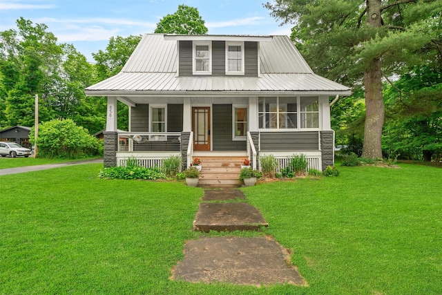 858 N Branch Hortonville Rd, North Branch, NY 12745 - view of front of house featuring covered porch, a front yard, and metal roof
