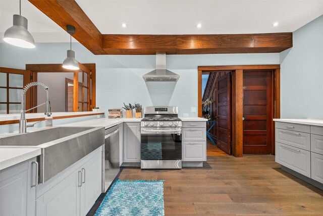 858 N Branch Hortonville Rd, North Branch, NY 12745 - kitchen featuring stainless steel appliances, island range hood, a sink, dark wood-style floors, and gray cabinets