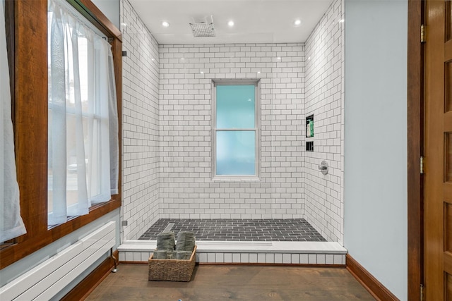 858 N Branch Hortonville Rd, North Branch, NY 12745 - full bathroom with a tile shower, recessed lighting, and wood finished floors