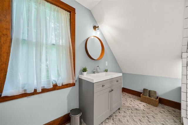 858 N Branch Hortonville Rd, North Branch, NY 12745 - bathroom with vanity, vaulted ceiling, and baseboards