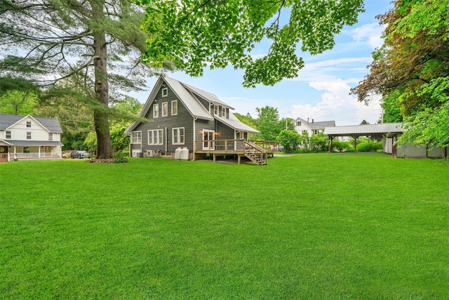 858 N Branch Hortonville Rd, North Branch, NY 12745 - rear view of house with a deck and a lawn