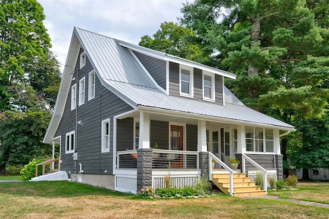 858 N Branch Hortonville Rd, North Branch, NY 12745 - view of front of home with a porch, a metal roof, and a front lawn