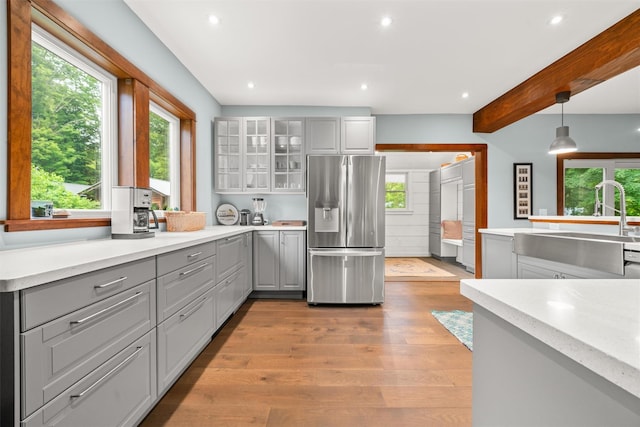 858 N Branch Hortonville Rd, North Branch, NY 12745 - kitchen featuring stainless steel fridge, gray cabinetry, healthy amount of natural light, light wood-style flooring, and recessed lighting