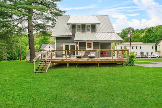 858 N Branch Hortonville Rd, North Branch, NY 12745 - rear view of house with a yard, a deck, and a metal roof