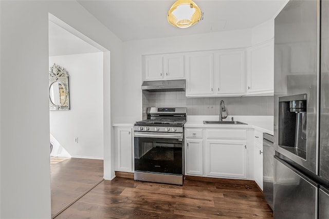 3665 Varian Ave, Bronx, NY 10466 - kitchen featuring appliances with stainless steel finishes, under cabinet range hood, a sink, light countertops, and backsplash