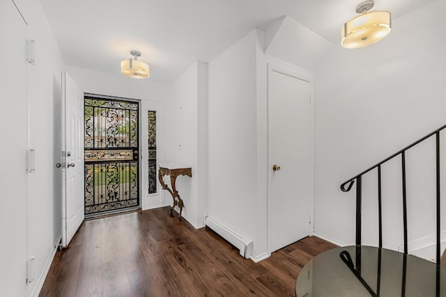3665 Varian Ave, Bronx, NY 10466 - foyer entrance with a baseboard radiator, dark wood-style flooring, and baseboards