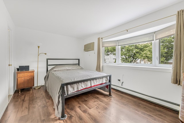 3665 Varian Ave, Bronx, NY 10466 - bedroom with a baseboard radiator, wood finished floors, and a wall unit AC