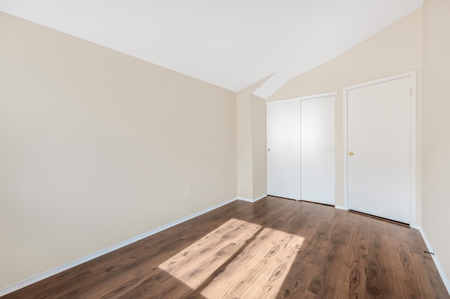 3665 Varian Ave, Bronx, NY 10466 - unfurnished bedroom with wood finished floors, baseboards, a closet, and lofted ceiling